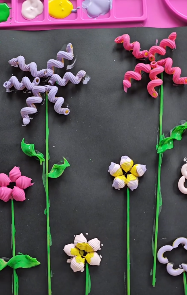 Craft Idea- Pasta flower garden craft made with painted pasta shapes